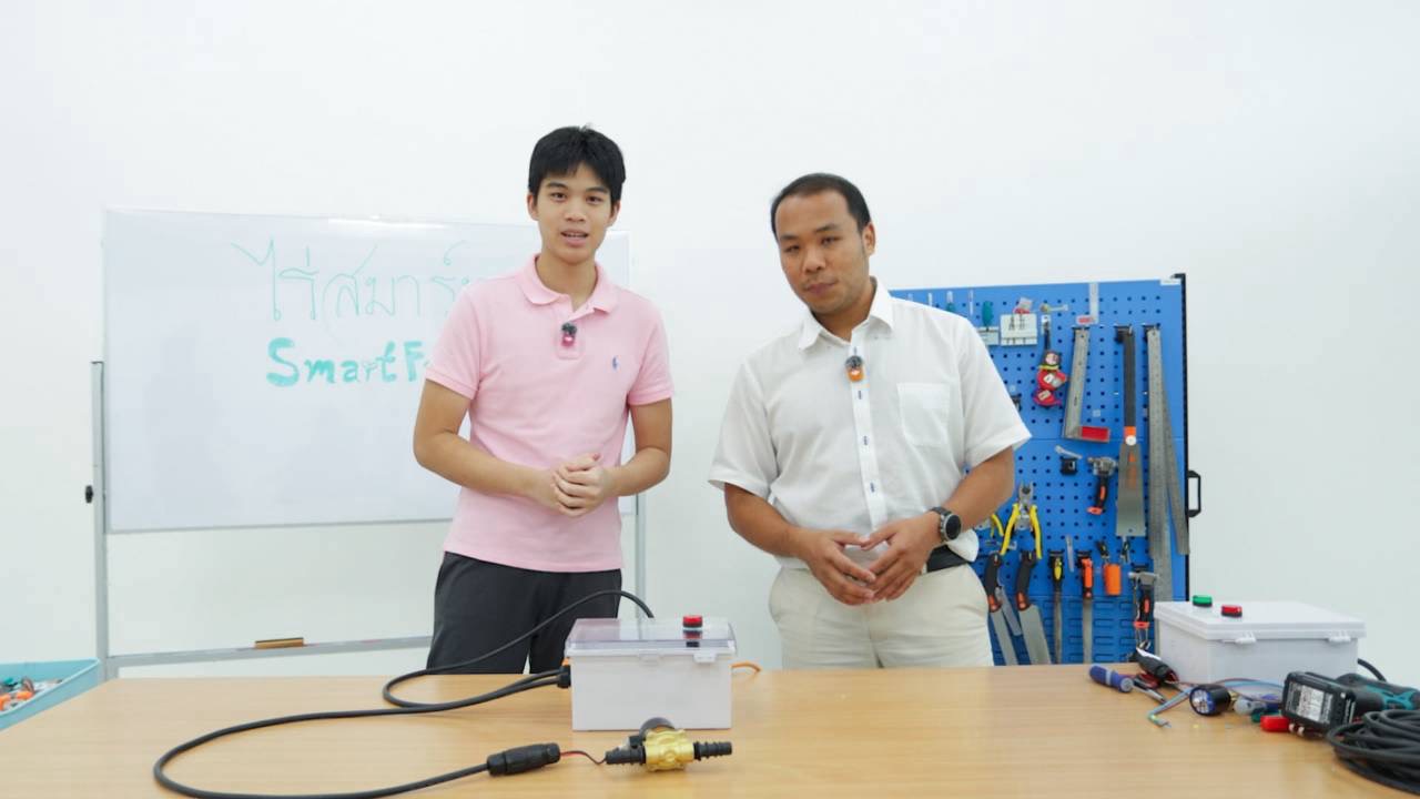 Tul turned toward Teacher Nok while explaining the equipment